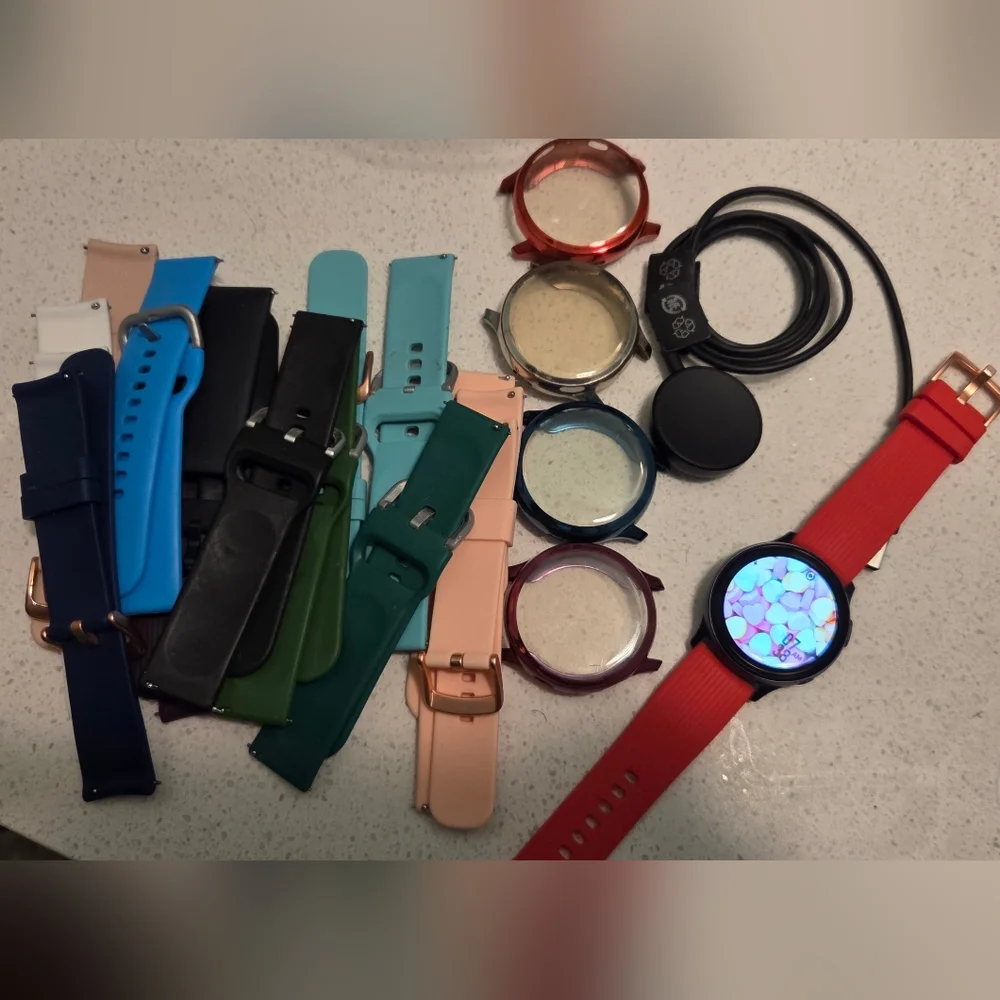 Samsung Smartwatch with Red Band and Accessories